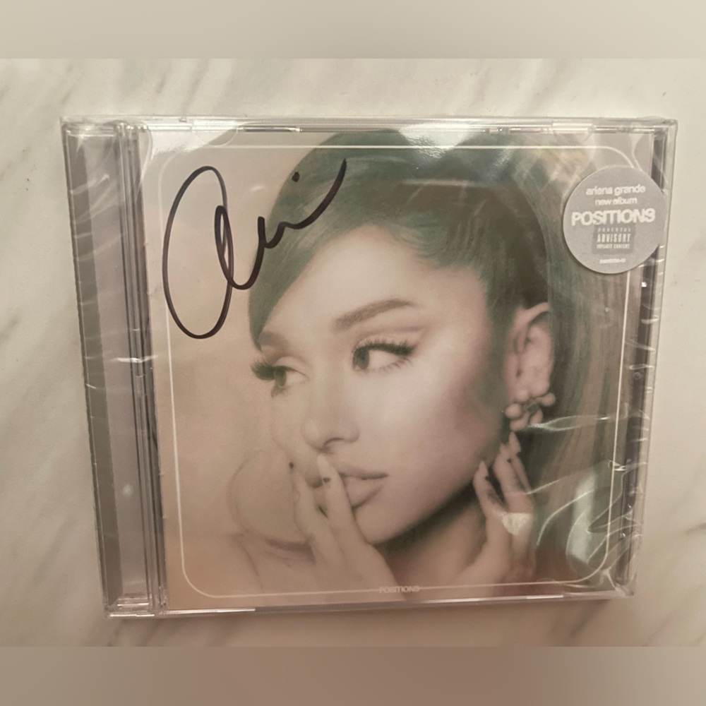 Ariana grande signed positions album. CD DISC